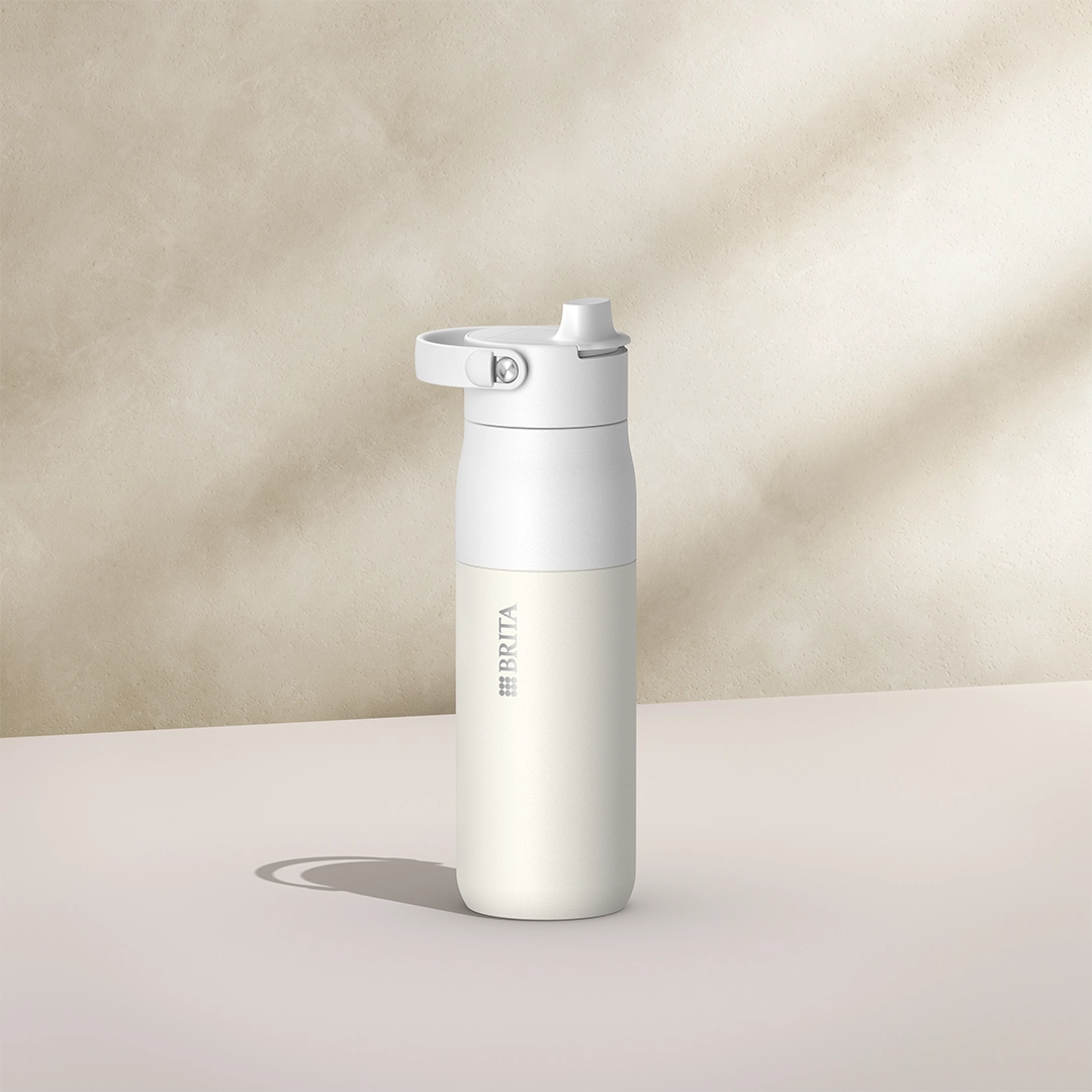 BRITA LARQ Essential Bottle, 680 ml, in white on a beige background.