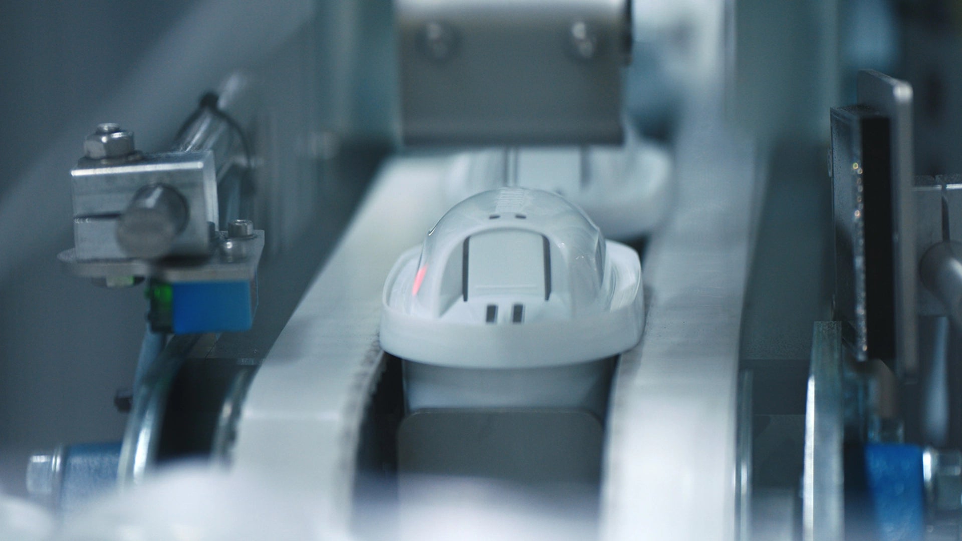 Close-up of a MAXTRA PRO cartridge on a production line.