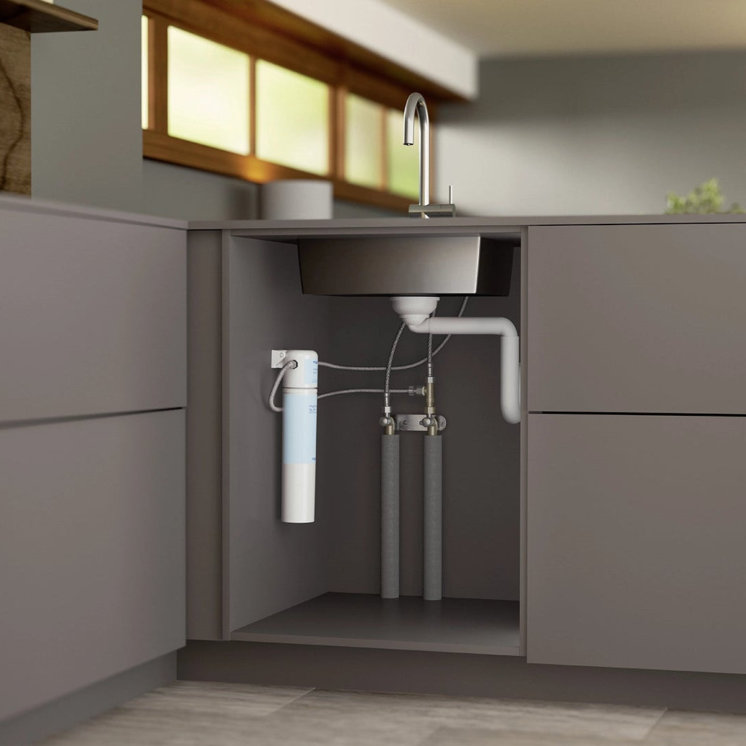 BRITA mypure SLIM water filtration system installed under a kitchen sink
